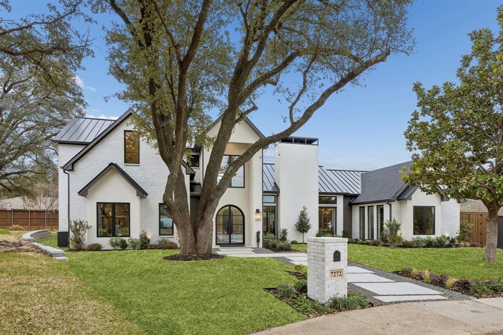 A true hidden gem, this brand new 5-bedroom, 5-full-bath, and 1-half-bath home by Seven Fifteen Custom Homes Inc offers 4,891 sq ft of refined, luxurious living. Tucked on a treed 0.370-acre cul-de-sac lot and zoned to Richardson ISD, it is private, elegant, and quietly set within one of North Dallas’ most established neighborhoods.

A grand entryway with graceful arched pass-throughs welcomes you to the main living area, featuring dramatic cathedral-style wood ceilings, a massive stone fireplace, custom built-ins, expansive windows framing the covered patio and backyard, and a stunning wine cellar. Rich White Oak hardwood floors flow throughout, enhancing warmth and timeless sophistication.

Designed for both entertaining and everyday living, the kitchen is a true centerpiece with a massive island, commercial-grade appliances, double ovens, a butler’s pantry with a second sink and dishwasher, and a hidden walk-in pantry. The first floor also includes a sun-filled office with custom built-ins, a guest bedroom with en suite bath, a media room, and a sitting area, offering flexible spaces for work, leisure, and gatherings.
The primary suite is a luxurious retreat with its own private laundry, a massive custom walk-in closet, and a spa-like bath with dual vanities, soaking tub, and oversized shower. 

Upstairs features a bonus room, an additional full bath, two bedrooms with private en suites, and another generously sized bedroom, providing abundant space for family and guests.

Mature trees and lush landscaping enhance the front curb appeal, while a covered patio and large grassy backyard provide an ideal space for entertaining or relaxing in privacy. A gated fence and three-car garage complete this meticulously executed residence. Every detail has been designed with intention, creating a timeless, sophisticated home, a true hidden gem for elevated, luxurious living.