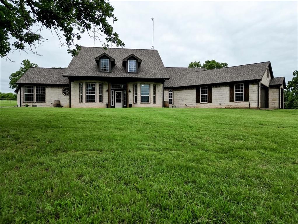 Beautiful 5 Bedroom home 4.5 bath sitting on 22 acres with scattered trees. This beautiful property offers 3 small ponds with a creek joining them through the property. The home is set up with luxury and comfort in mind with all bedrooms on the main level. Leaving a spacious game room with bar and a large media room with projector and screen on the 2nd level. Backyard is a wonderful place for the family and friends with a large in ground in ground pool with a balcony overlooking from the upstairs game room! The property also offers a 30x50 insulated shop with a 20x50 covered parking attached to the building. The shop is wired and plumbed. Also, has attached 30x20 roof with 3 livestock pens attached on the side of the building. The property is fenced and crossed fenced with lots of lush green grass and large mature shade trees. There is plenty room to grow and add the arena or barn or pastures of your choosing. There is also a concrete slab sports court across the driveway with a power pedestal to plug in RV or Campers. This a beautiful property ready to move into and start living!