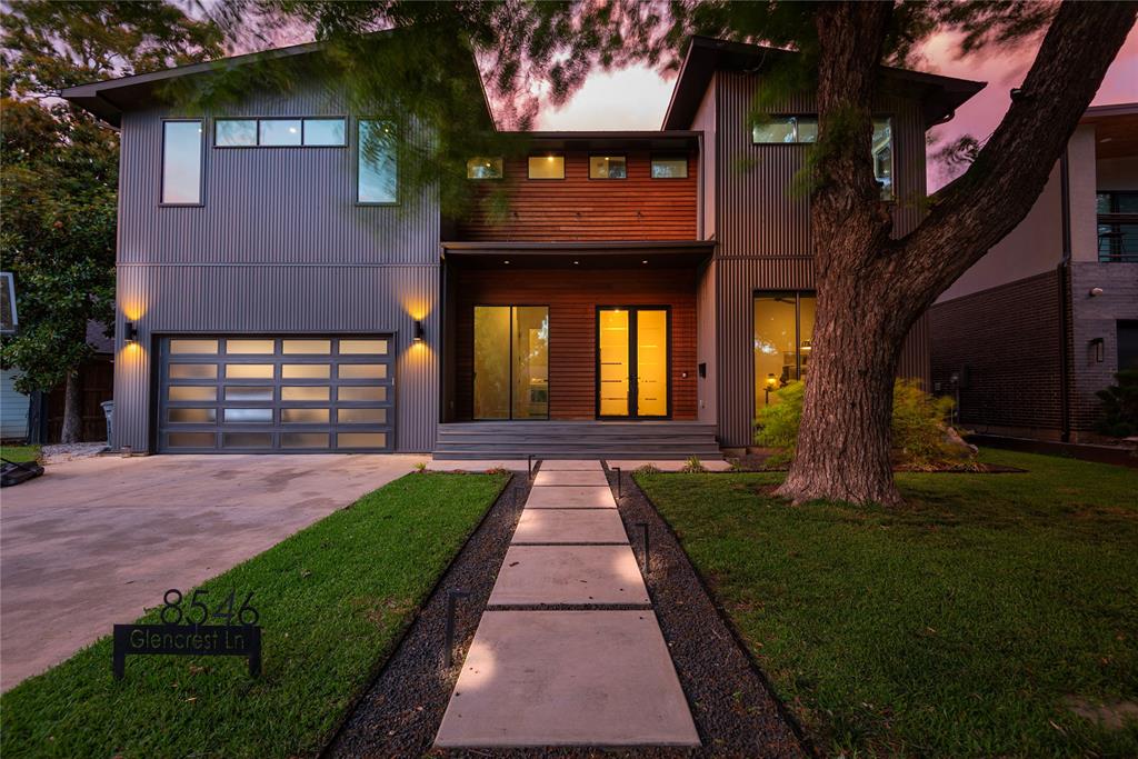 Situated on one of West Bluffview's most adored streets sits 8546 Glencrest Lane.   As you step in, you are greeted in the foyer with breathtaking floor to ceiling windows that illuminate natural light throughout the house. The home features smart home technology, a Wifi eco-friendly thermostat and spray foam insulation throughout to keep the home cool in the summer and warm in the winter. A gourmet chef's kitchen features Bertazzoni appliances, a walk-in pantry and an integrated granite and walnut waterfall island with views facing the expansive dining and living areas. Outside sits the cedar wood patio featuring an incredible indoor and outdoor living experience.  Every corner of this property was thoughtfully designed to entertain, complete with a temperature controlled 150 bottle Allavino wine fridge off the main living near the wet bar. 

The first level features an ultra private primary suite, nestled away from the living area with high end lighting and fixtures. Three additional bedrooms on the second level, each with their own suite. The second level also features a second living space, upstairs laundry room and a wet bar with a balcony. A rare opportunity to own a 2020 newer construction built home in one of the best neighborhoods Dallas has to offer. 10 minutes to Downtown Dallas and close proximity to some of the best shopping and dining in Dallas.