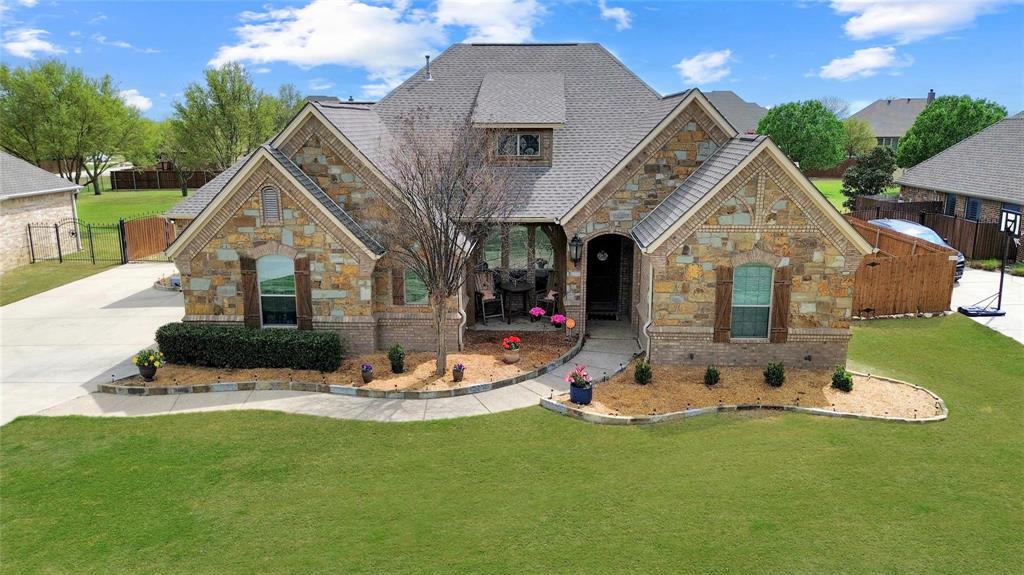Charming 4-bedroom, 3-bathroom home on a spacious 0.5-acre lot with a large backyard—perfect for entertaining, outdoor living, and future additions. This move-in ready home features a flexible floor plan with a dedicated home office and a generous upstairs bonus room ideal for a game room, media room, or playroom. Interior highlights include a cozy fireplace, updated paint, and custom antiqued cabinets that add warmth and character throughout. The open and functional layout offers abundant natural light and comfortable living spaces. The kitchen is equipped with modern appliances, ample counter space, and plenty of cabinetry—perfect for everyday living and hosting. All bedrooms are generously sized with ample closet space, including a spacious primary suite. Enjoy peaceful living with room to grow, all while being conveniently located near shopping, dining, and top amenities.