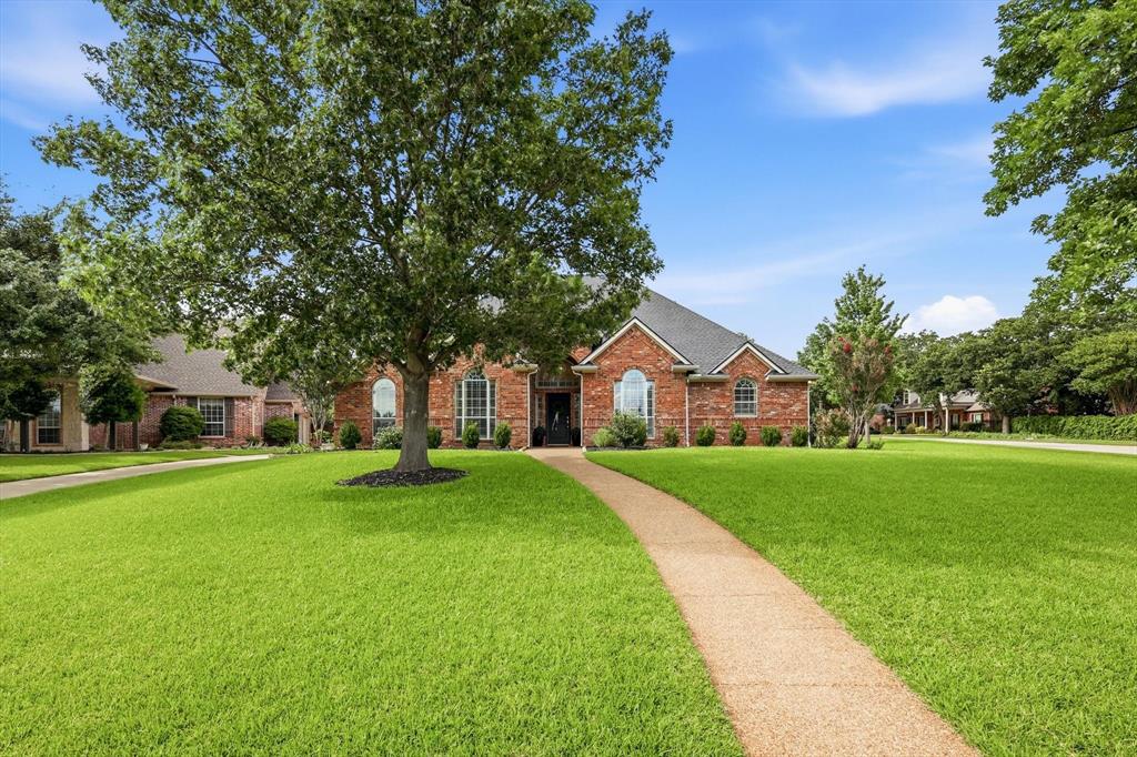 Nestled on a premier .41-acre cul-de-sac lot in Keller's established Chapelwood Estates, this beautifully maintained home offers an exceptional blend of space, comfort, and functionality. Designed for both everyday living and entertaining, the flexible one-and-a-half-story floor plan offers a variety of spaces to fit your lifestyle. A two versatile front rooms can serve as a formal dining area, home office, or additional living space, while three bedrooms and two-and-a-half baths are conveniently located on the main level. Upstairs, a spacious game room with a full bath provides the perfect retreat and is currently used as a fourth bedroom. The kitchen opens seamlessly to the oversized family room and breakfast area, creating a welcoming gathering space for family and friends. Quality craftsmanship is evident throughout with plantation shutters, engineered hardwood flooring, solid-core doors, a see-through fireplace, and thoughtful custom details that add warmth and character throughout the home. Pride of ownership shines through in the meticulous care and maintenance of the property. The four-car garage spaces and automatic wrought iron gate provide exceptional functionality, storage, and convenience. Outdoor living includes a covered patio, custom pergola, mature trees, and a spacious backyard with grassy play space. The expansive lot offers room to relax, entertain, garden, or customize to fit your lifestyle. Offering a rare combination of privacy, flexibility, and established charm, this Chapelwood Estates property presents an outstanding opportunity in one of Keller's most desirable neighborhoods. Residents enjoy convenient access to highly rated Keller ISD schools, Bear Creek Park, The Keller Pointe fitness and aquatics center, along with a wide variety of shopping, dining, and entertainment options nearby.