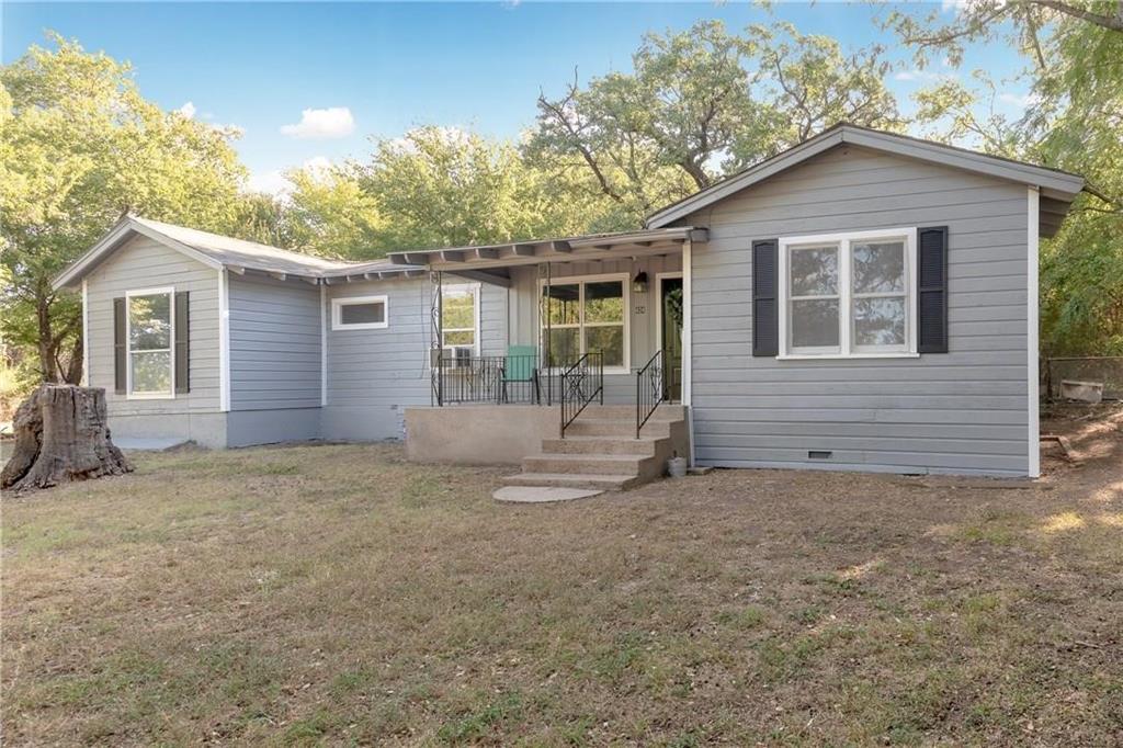 Owner financing is available on this cute 3 bed 2 bath home on over a half acre.  Both bathrooms have a new shower and tub surround, new water heater, all new pex plumbing, and window units have been replaced with mini splits throughout.  Needs some paint and TLC, but don't miss this opportunity to get a home on a great lot, conveniently located in Azle, nestled in mature trees, with seller financing. Home is priced under comps in lieu of work needed.