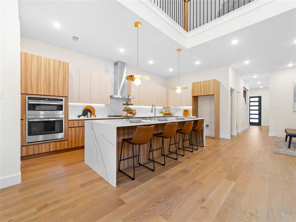 416 Mount Auburn Avenue · Dallas, TX 75223

5 Bed · 4.5 Bath · 4,200 Sq Ft · New Construction · $799,900
Nearly 4,200 square feet of brand-new construction in one of East Dallas's most sought-after pockets, and now priced to move. Welcome to 416 Mount Auburn.
This is a home designed for how people actually live. The first-floor primary suite delivers true privacy and generous proportions, no stairs at the end of a long day. Upstairs, a dedicated home office, media room, and game room give every member of the household their own space without the home ever feeling divided. Five bedrooms, four and a half baths, and room to grow in every direction.
The kitchen earns its reputation. Flat-panel frameless cabinetry, Calacatta white quartz waterfall island, full-height backsplash, undercabinet lighting, GE stainless appliances, and a vented designer hood. European oak engineered hardwood, vertical black cable railing, 6 in baseboards, and 5-panel shaker doors carry that same standard through every room.
Built to last and built to perform: 5-ton 2-zone HVAC (16 SEER - 95% AFUE), spray foam insulation, NFRC-certified windows with STC noise reduction, tankless water heater, Energy Code Green Certified, and built-in Taexx pest control. EV-ready oversized garage. Pool-ready backyard with 8' cedar privacy fence and full sprinkler system.
Step outside and you're on the Santa Fe Trail with direct access to White Rock Lake. Tenison Park Golf, Samuell Grand Park, Lower Greenville, the Granada Theater, Deep Ellum, and the Baylor Medical District are all minutes away. DART rail access. Zoned to Mount Auburn Elementary, J.L. Long Middle, and Woodrow Wilson High, with Lakehill Prep, St. John's Episcopal, Hockaday, and Lakewood Montessori nearby.
Highlights sheet and floor plan attached. Schedule your private showing today.