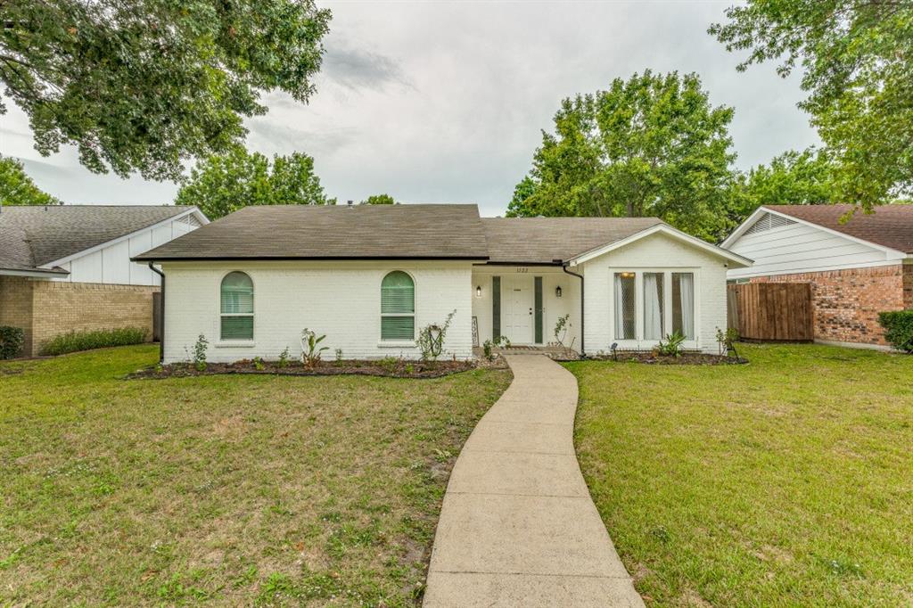 This 3 bedroom, 2 bath home features a spacious open-concept kitchen with quartz countertops, a built in beverage fridge, stainless steel farmhouse sink, and water softener. Wood like tile installed in 2022 throughout the common areas. Windows and sliding patio door were replaced in 2022 allowing for ample natural light and energy efficiency. Bathrooms were remodeled in 2019 including marble counter tops in the primary bath. Large backyard, with privacy fence replaced in 2022 plus a covered patio, perfect for entertaining guests! This property offers convenient access to shopping and restaurants located minutes from Firewheel Mall and major highways. Don't miss your chance to make this house your forever home!