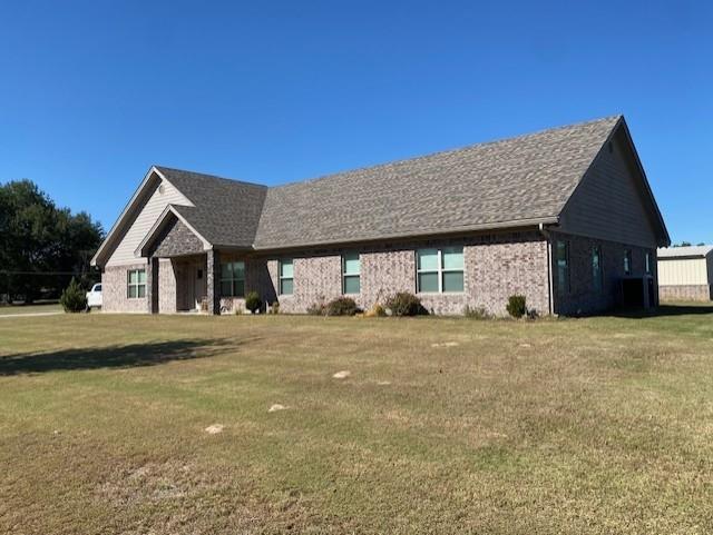 Beautiful custom-built home situated on 1 acre in the highly desirable Rivercrest ISD. This thoughtfully designed residence features an open floor plan connecting the dining room, kitchen, living room, and a cozy den perfect for reading or watching TV. The dining area includes custom built-in shelving and storage. The kitchen is a standout with an expansive island, granite countertops, and abundant custom cabinetry—ideal for cooking and entertaining. The spacious living and den areas offer comfort and flexibility. The home includes three generously sized bedrooms with walk-in closets, two full bathrooms, and a convenient half bath located in the mudroom off the garage. Additional amenities include a laundry room, a 2-car garage, and a covered back patio. Outside, enjoy a 20x20 insulated workshop with electricity, large mature trees.  Propane heating and a generator provide added security and comfort. This property offers privacy, space, and quality craftsmanship—