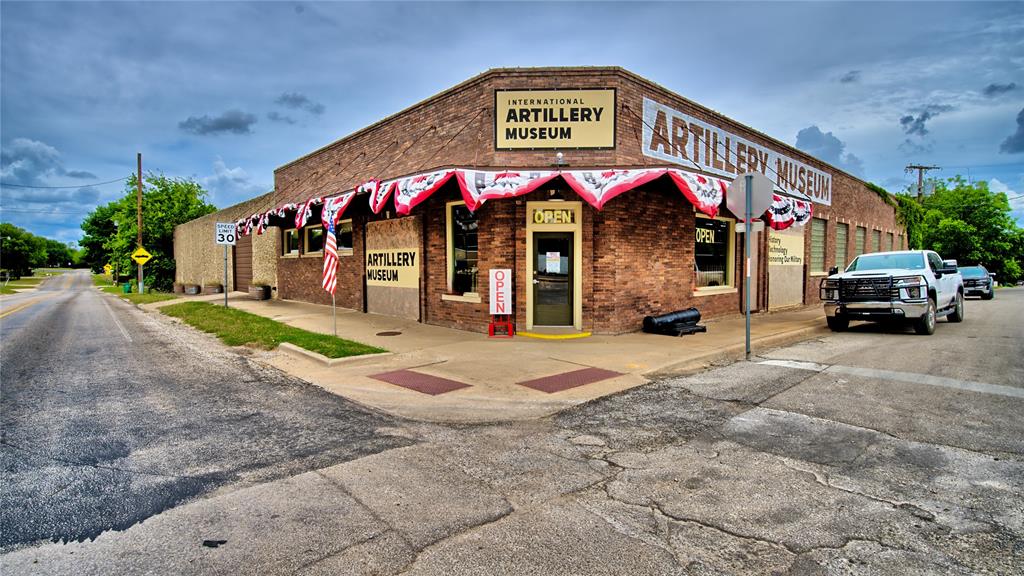 This is a 20,000 + square foot building with 3 offices, 8 bathrooms, working shop and open area show room and a 150' X 90' parking lot in the back.  I will leave your imagination to all of the different possibilities that you can do with this great building.