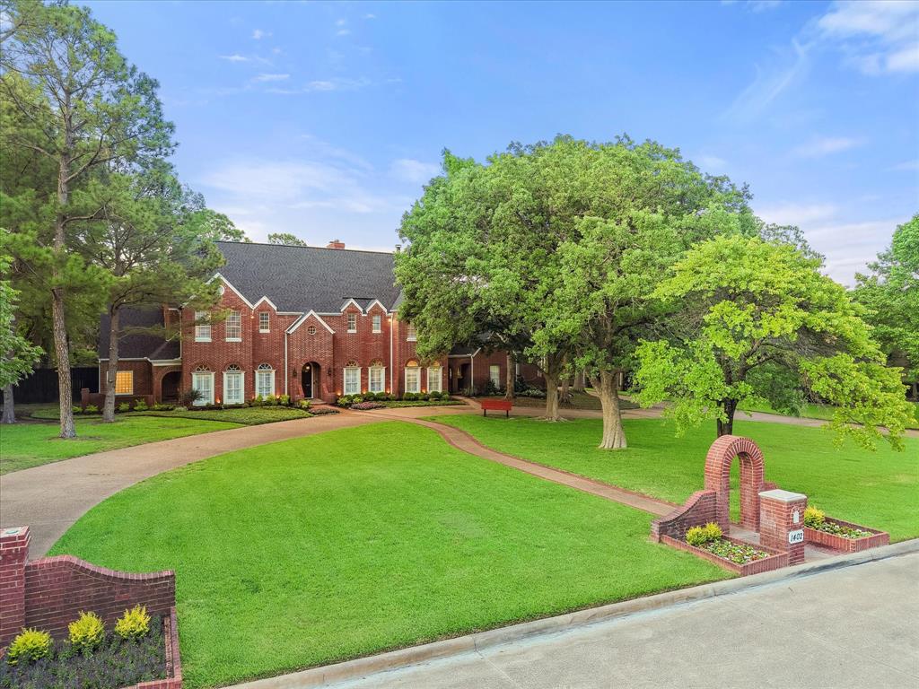 Tucked away on a quiet Southlake cul-de-sac, this one-of-a-kind residence sits on a heavily treed, one-acre lot with no HOA in exclusive 14-home Cedar Creek Plantation. Surrounded by million-dollar estates and bordered by untouched multi-acre forest, the setting offers rare privacy and breathtaking views with a park like country garden feel. Stunning brick home is architecturally bold and creatively designed and features a dramatic 18-cluster skylight wood beam ceiling in the living room and a striking see-through brick fireplace shared with the kitchen. Flexible floorplan includes 5 bedrooms, 5 full & 1 half baths, a spacious game room with bonus reading area, piano room, reading nooks, storage space, formal dining, and a private study with serene views. Enjoy year-round entertaining on the screened in covered patio with spa and access to the outdoor pool, Trex deck, expansive acre with lush landscape, mature trees and a private grandfathered water well with 2,500-gallon holding tank. New Class 4 Impact Resistant Roof, Gutters & Downspouts in Dec 2024, Freshly Painted Interior & Exterior including exterior light fixtures and wrought iron fence around the pool in addition to numerous upgrades throughout home. Don’t miss this stunning estate, thoughtfully designed for entertaining with multiple living and dining areas, wet bar, spacious game room, perfect for hosting family and friends.