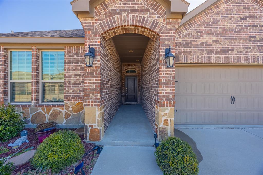 Summer blessing for you!! Seller needs to relocate and is being generous to drop the price below value. Bring us an offer!
 One story home near Celina High School! No PID or MUD! 
Welcome to modern living and sustainable design, a stunning newer home. This property is a sanctuary of comfort and efficiency!
The home boasts an impressive 10-foot ceiling in the main living areas and the primary bedroom, creating a spacious atmosphere that invites tranquility and openness. With four bedrooms and three full bathrooms, it's designed to accommodate a family or a group of friends with ease. The guest suite offers a luxurious ensuite or a dedicated space for teenagers, ensuring privacy and comfort for all.
The primary bedroom, spanning 20 by 14 feet, is a haven of relaxation, and a huge walk-in closet! The kitchen is equipped with a butler's pantry, ample cabinetry, stainless steel appliances and a gas cooktop, adding a touch of sophistication to your culinary adventures. The rear patio covered, provides a serene retreat, perfect for unwinding after a long day. 
This is a DR Horton home, and the plan is the Emory Package, which includes wood tile flooring throughout the main areas, all wet areas, and a high-quality level 1 granite in the kitchen. The private backyard featuring an upgraded level 2 stone elevation and a buff mortar. 
Experience the joy of living in a home that is as beautiful as it is responsible, where every detail has been carefully considered to create a space that is both inviting and environmentally conscious. Green energy appliances and HVAC. Community fishing pond nearby. Fridge will convey with the property. Seller's lender for their new build is offering your buyer 2 PERCENT OF LOAN amount to help with closing costs or buy down points.