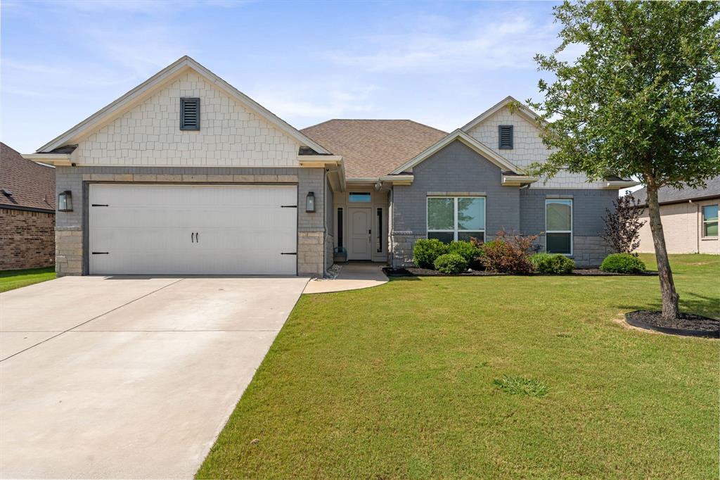 Beautifully maintained 3-bedroom, 2-bath MK Custom Home located in Godley Heights and Godley ISD. Built in 2018, this 1,668-square-foot home offers a functional layout, quality finishes, and numerous recent updates that make it move-in ready. Recent improvements include new carpet, fresh interior paint, freshly painted baseboards, updated kitchen and bathroom cabinet paint, freshly stained fencing, and smart home features throughout. The home includes an Alexa-compatible smart thermostat, Blink security camera system with five cameras, and a biometric front door keypad offering both fingerprint and code access. Refrigerator conveys with the sale. Inside, you’ll find crown molding, a spacious living area anchored by a wood-burning fireplace, and a kitchen that opens to the main living space for easy everyday living and entertaining. All three bedrooms feature walk-in closets, while the primary suite offers a large walk-in shower and comfortable retreat from the rest of the home. Step outside to enjoy the covered patio and oversized backyard, providing plenty of space for outdoor activities, pets, gardening, or future customization.
Conveniently located in Godley Heights with quick access to schools, shopping, and commuting routes, this home offers modern features, recent updates, and exceptional value in one of the area’s most desirable school districts.