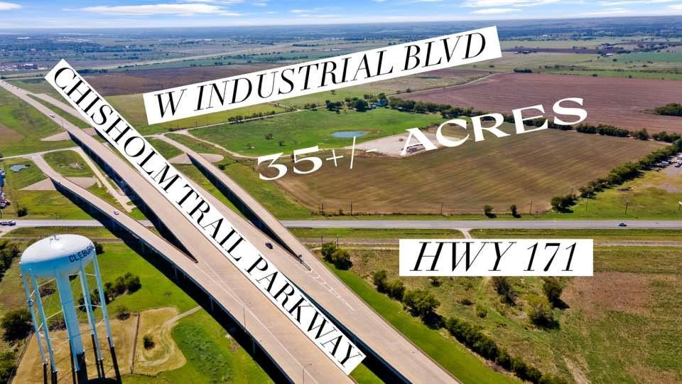 LAND PRIME FOR COMMERCIAL DEVELOPMENT WITH FRONTAGE ON 3 SIDES. NW corner of Chisholm Trail Parkway and W Industrial Blvd. (also known as County Road 1125).  Approximately 1116 feet on Chisholm Trail Parkway (east boundary line); approximately 1096 feet on County Road 1125 and Industrial Blvd.; and approximately 503 feet along Highway 171.  1210 and 1222 W Industrial Blvd zoning is SF-7. 1300 CR 1125 zoning is Interim Holding (to be determined).  Seller says no production on gas pad for about 2 yrs. Residence is approximately 2,353 square feet and was built in 2009 with 2 detached garages. City water and electric. According to the City of Cleburne, city sewer is coming to the area. Drainage and utilities improvement project in supplemental documents. Properties to be sold together are 1210 & 1222 West Industrial Blvd. and 1300 County Road 1125. Tax ID's for the 4 tracts are 126-0269-00085, 126-0269-00082, 126-0269-00081, and 126-2933-01010. There is an agriculture lease for pasture and crops. Gas company informs that they will reclaim the well early, plug the well and remove all above ground equipment. Amazon announced construction for a new operations facility in Cleburne at the southwest corner of W Industrial Blvd and Chisholm Trail Parkway, which is just south of the subject property. The new facility will be approximately 1.7 million square feet.