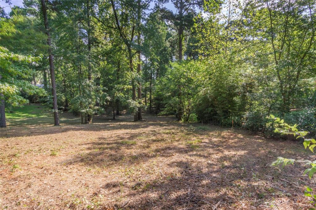 Wonderful lot in Spring Lake! Don't miss an opportunity to build your dream home by securing this rare opportunity of purchasing a lot in an established neighborhood. It is only 0.2 miles from Pierremont Oaks Tennis Club with tennis, swimming and a restaurant. It is 3.4 miles from Christus Highland Medical Center, and 4.8 miles from Oschner LSU Health! Very convenient to shopping and schools. Take a stroll around the pretty tree lined lot and walk over to the tennis club to see just how close it is!

Lot next door is for sale as well!!