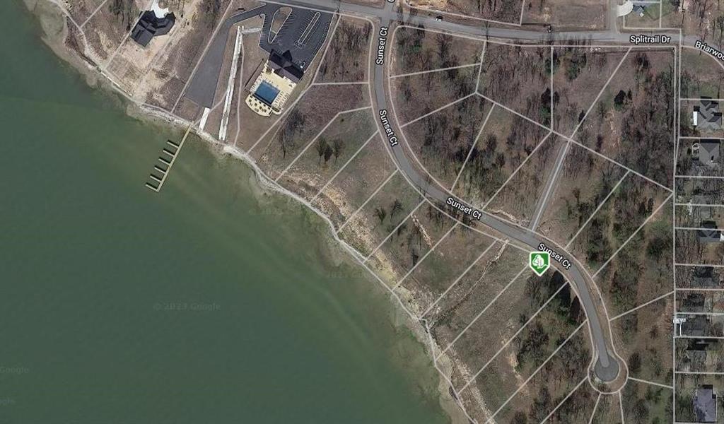 Beautiful waterfront lot on Cedar Creek Lake, located less than an hour from Dallas! Create your dream lakefront retreat and private dock within the gated community of Cedar Creek Landing. The property is just a short walk from the community clubhouse featuring an infinity-edge pool, fitness center, and resident lounge.
Enjoy expansive open-water views and stunning sunset scenery on one of Texas’ most sought-after recreational lakes, renowned for boating and fishing. Golf enthusiasts will appreciate having Cedar Creek Country Club right next door. Conveniently located with easy access to Highway 175 and just minutes from the dining, shopping, and entertainment options in Mabank — often referred to as the “Hamptons of Dallas” for its popular lake lifestyle and weekend retreat atmosphere — as well as nearby Gun Barrel City.
A rare and unique opportunity to own adjacent lots at  768 and 766 Sunset Court, offering added flexibility, expanded building potential, and the chance to create an exceptional lakefront estate.