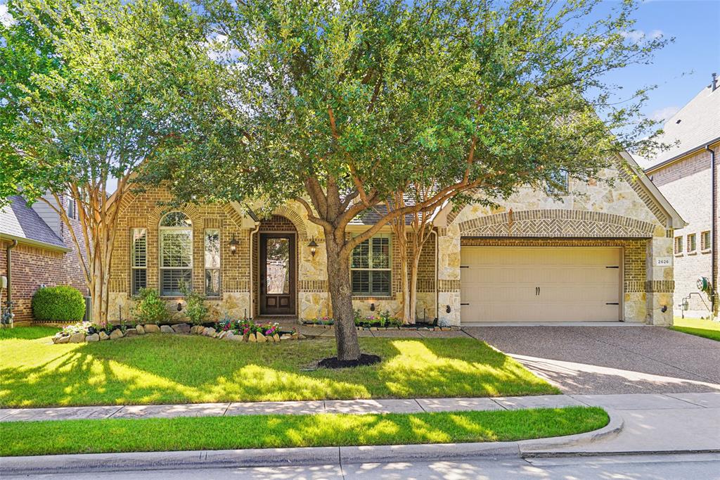 Welcome to this beautifully maintained one-story home offering 3 bedrooms, 2.5 bathrooms, and a private office in the highly sought-after Highlands of Trophy Club. Ideally located just minutes from the community pool, parks, and highly rated schools, this home combines comfort, functionality, and an exceptional location. Step inside to rich hardwood flooring that flows through the main living areas and plantation shutters throughout. The dedicated office features custom built-in shelving, creating the perfect space for working from home or a quiet reading retreat. The gourmet kitchen is designed for both everyday living and entertaining, featuring a large center island, gas cooktop, abundant cabinetry, a walk-in pantry, and an open layout that overlooks the living space. A separate dining room provides the ideal setting for family gatherings and holiday celebrations. The updated primary suite offers a relaxing escape with dual vanities, separate shower with a built in heater, and an oversized walk-in closet. Enjoy outdoor living year-round on the extended covered patio complete with a beautiful pergola, built-in grill, and gorgeous landscaping—perfect for entertaining friends and family or simply unwinding at the end of the day. The home also features a reverse osmosis system and recent roof replacement. Enjoy the best of DFW living with award-winning schools, exceptional community amenities, and convenient access to DFW International Airport, major employment centers, and some of the area's finest shopping and dining destinations.