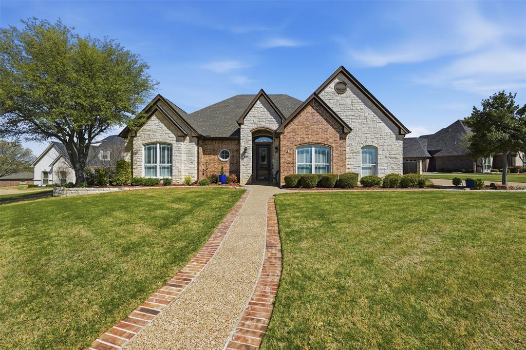 BACK OF BELLE MEADOWS HOME WITH POND VIEWS - NEW PRICE! Discover this exquisite custom-built home nestled in one of Cleburne's most peaceful and sought-after neighborhoods. This stunning 3-bedroom, 2-bathroom residence with a 3-car garage offers an exceptional blend of luxury, comfort, and convenience, making it the ideal setting for relaxed living and entertaining. Belle Meadows offers a Community Pool & Fishing Pond with sidewalks for peaceful strolls.

Step inside to find an expansive living area adorned with tall ceilings and an abundance of natural light that enhances the spaciousness of this meticulously maintained home. The quality of craftsmanship is evident in every detail, from the rich hardwood floors to the custom built-ins and extensive cabinetry. The heart of the home is undoubtedly the huge kitchen, featuring a sizable island, bar seating, and Kitchen Aid appliances. With two large dining areas, the space is perfect for hosting dinners and gatherings.

The main living room boasts a cozy gas fireplace, adding warmth and character, and tall ceilings with arched entryways. Additional living space at the back of the home is the perfect place to unwind while basking in the serene water views.

Plantation shutters frame the windows, offering both elegance and privacy. The primary bedroom is a serene retreat, with a luxurious en-suite bathroom featuring a large soaking tub and walk-in shower.

This property extends its charm outdoors, where a spacious back patio offers a picturesque spot for al fresco dining or simply enjoying the view of the pond.

Experience the epitome of custom-designed living in this exceptional Cleburne home, where every detail has been thoughtfully considered to create a warm and inviting haven. Your dream home awaits!