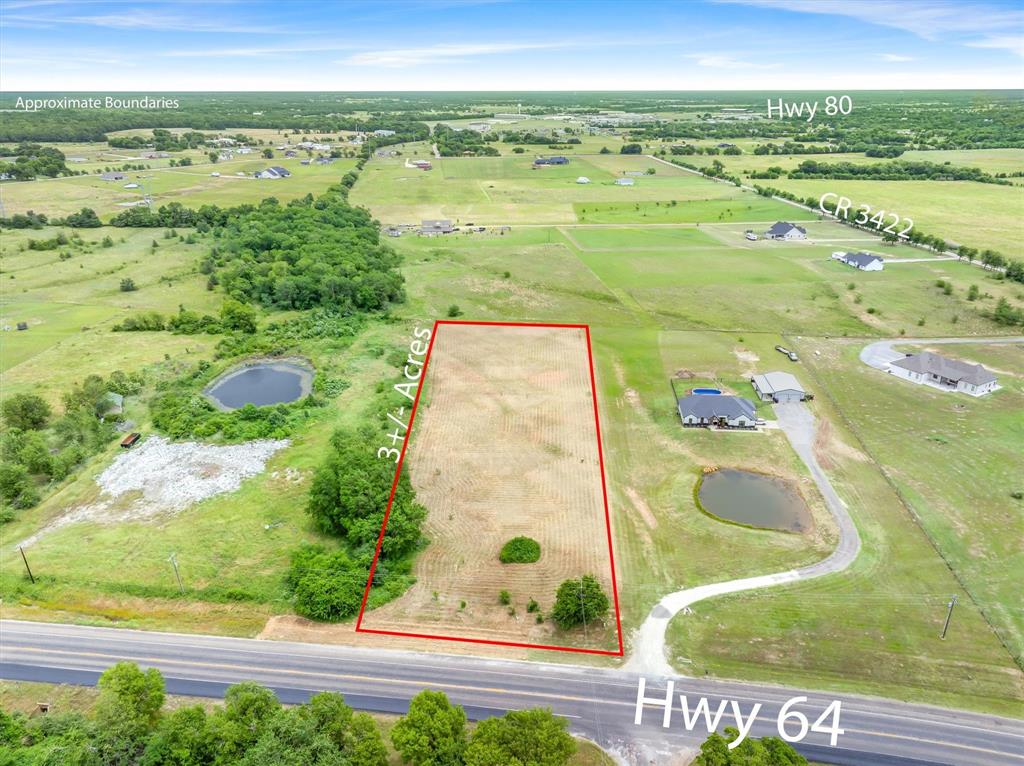 This 3 acre parcel sits nicely just south of Wills Point on Hwy 64 surrounded by large homes and barndominiums.  Great location for building your family homestead and easy access for commuters.  This is an approved subdivided lot with deed restrictions for building (see documents section).  Direct access to Hwy 64 and survey available.  Utilities are at the road.
