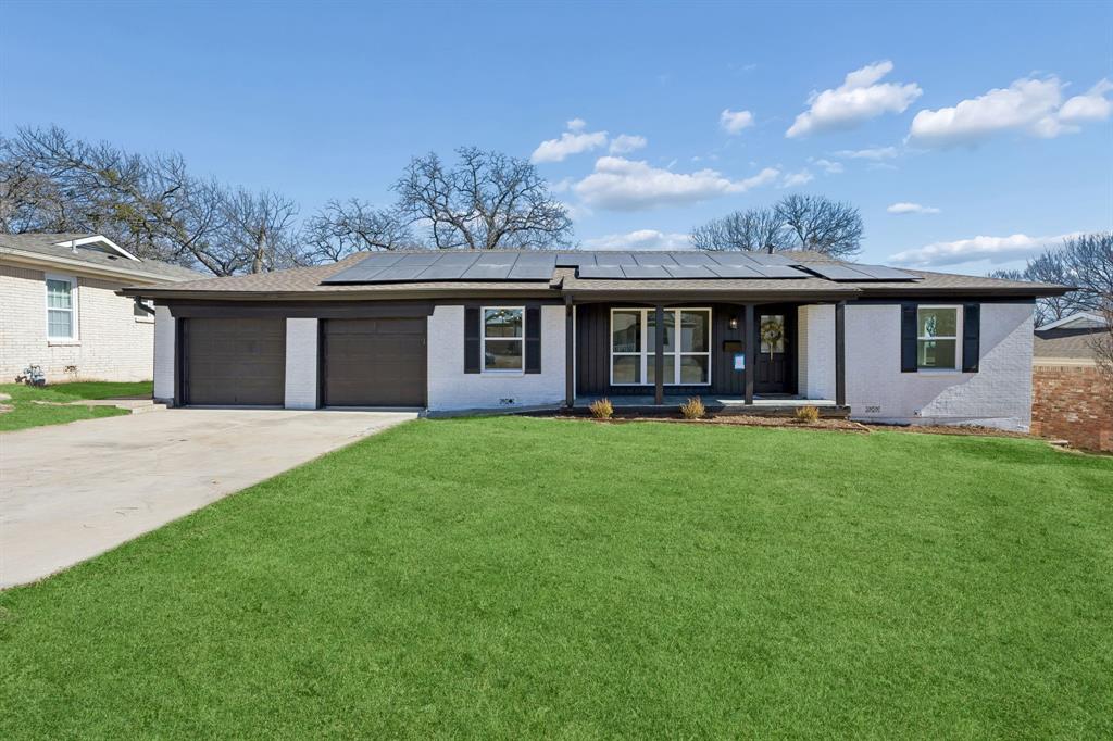 Welcome home to this beautifully updated Bedford gem! This charming single-story home offers inviting curb appeal with fresh exterior paint, a spacious driveway, and a well-maintained front lawn that sets the tone for what’s inside. Step into a bright, open living and dining area filled with natural light, stylish finishes, and warm luxury vinyl flooring. The stunning kitchen features crisp white cabinetry, modern hardware, sleek countertops, subway tile backsplash, and stainless steel appliances, creating a clean and contemporary space for cooking and gathering. Thoughtful updates throughout the home provide a fresh, move-in-ready feel while maintaining a cozy, welcoming atmosphere. Enjoy a convenient layout with comfortable living spaces, updated lighting, and neutral finishes that complement any décor style. Fully paid-off solar panels convey with the property, providing energy efficiency and long-term savings. Located in a quaint neighborhood with easy access to major highways, shopping, dining, and parks, this home offers both comfort and convenience!