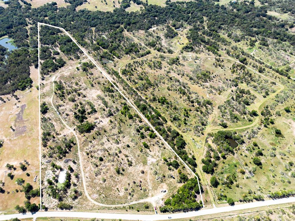Approximately 46 acres offered for sale to create your dream ranchette! Just outside the City of Corsicana in Mildred ISD, you're just a short drive to Richland Chambers Reservoir. There's a small pond on the property and a creek that runs through the back acreage. M.E.N water available across the road. Ag exempt.