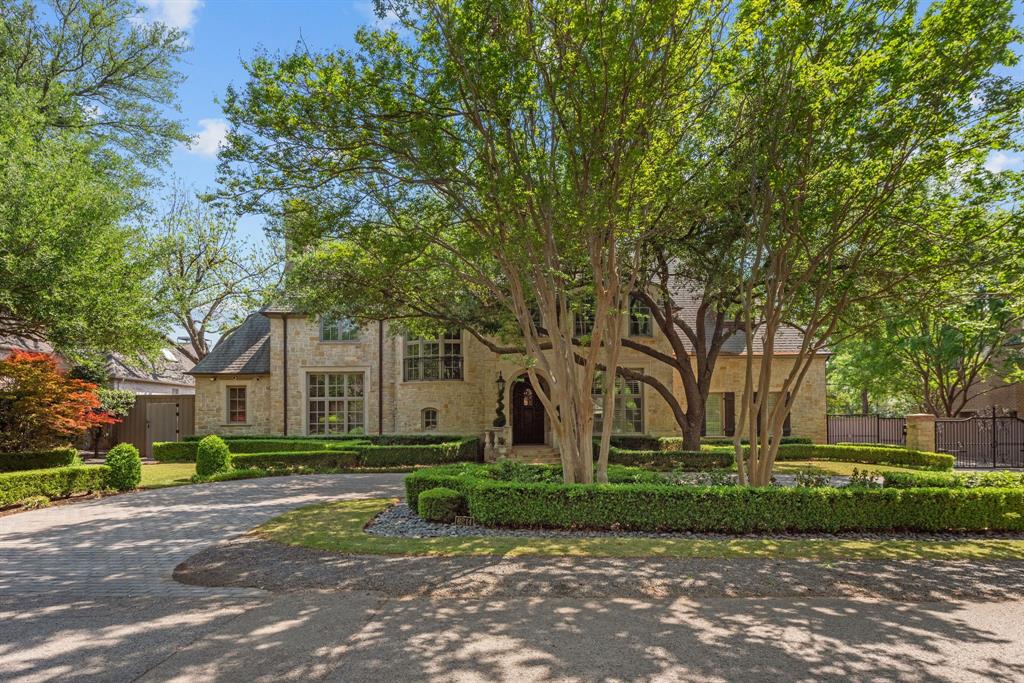 Exquisite French Mediterranean-style home, with a circular drive, featuring an electrical gate entry to garage. Hand scraped hardwood floors, two stairways with wood landings, custom cabinetry, plantation shutters, curved iron stairway, the details are impeccable. The kitchen is equipped with Sub Zero and Wolf appliances, a large island, double ovens, and butlers pantry. There is also a refrigerated wine cellar that holds 500+ bottles, a media room, library, the primary suite features a spa inspired bathroom with heated floors, a gilded groin vault ceiling, and a white solid marble tub.
The outdoor living space includes a stone fireplace, outdoor kitchen with with a built-in gas grill, fridge, ice maker, with pristine landscaping and a zoysia grass upgrade, a seating area with a fire pit, a newly replastered pool and spa, with deck jets and fountains. 
Extra features include a tankless water heater, covered veranda on the side of house for pool equipment, wired for a Lutron system, and security system. Front yard and backyard landscape lighting as well.
Award winning builder, Allen Nixon, and architect CA Nelson.