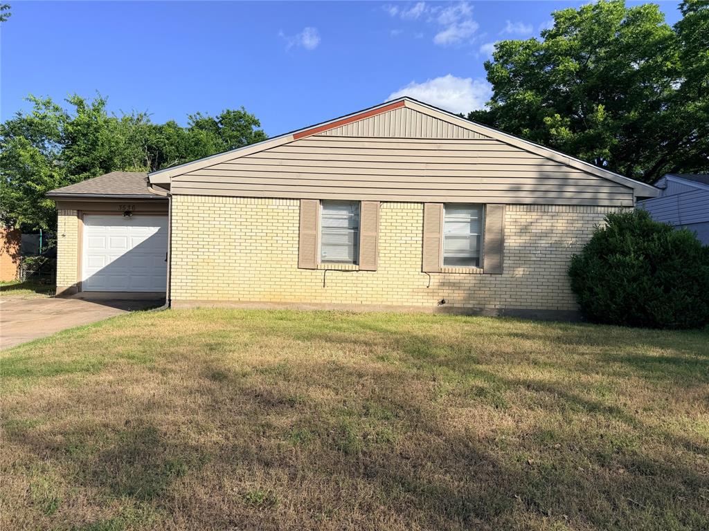 one of the few Brick Homes on Pione Ave. Perfect for a first-time home buyer or scaling down in an established Neighborhood. Fenced in back yard with a storage building. washer and dryer connections are in a separate outside room for peace and quiet on Laundry Day.
Single Car attached garage with an extended Driveway.