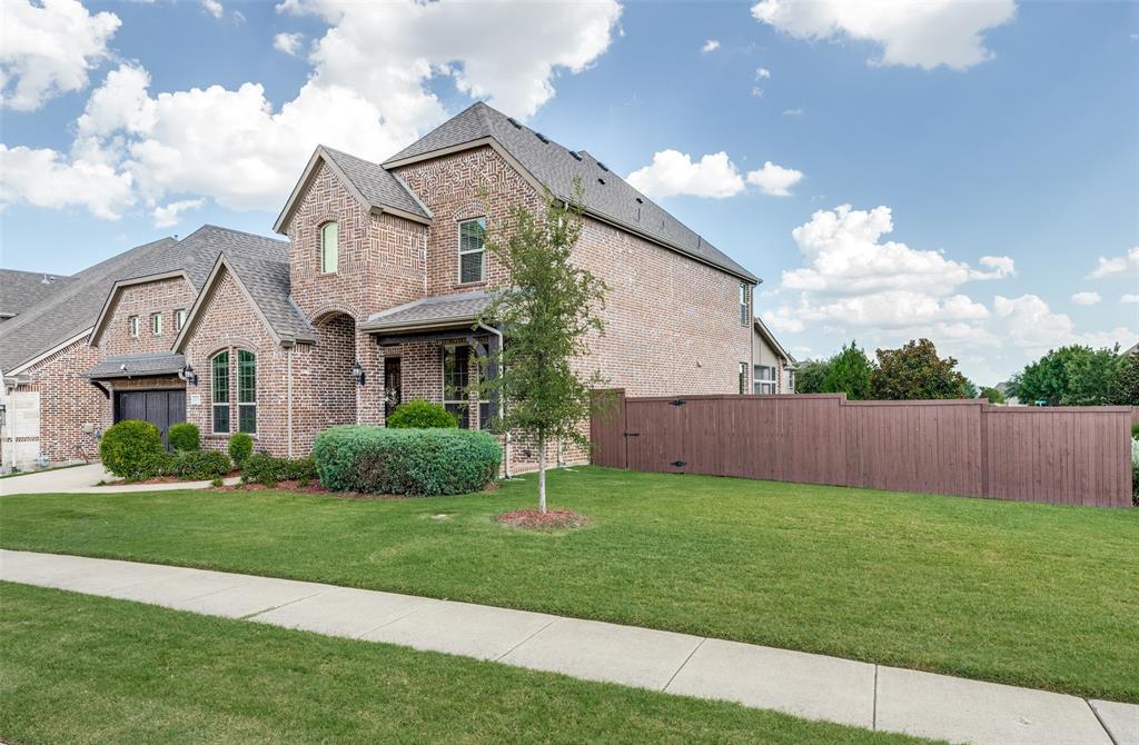 LUXURY LIVING Meets RESORT LIFESTYLE! Experience timeless architecture in this impeccably maintained custom brick home nestled within Wynn Ridge Estates of Stonebridge Ranch. Perfectly positioned on a desirable corner lot! From the stunning basket-weave brick to the soaring stone fireplace and beautifully appointed chef's kitchen, every detail reflects quality craftsmanship and design. Featuring 2 bedrooms on the first floor, ensuite baths for upstairs bedrooms, plus a half bath for game room, mechanical updates, and an inviting screened outdoor living space. This exceptional home combines refinement & comfort in one of McKinney's most sought-after master-planned communities. Designed for both everyday living & entertaining, the heart of the home is an impressive open-concept kitchen overlooking the dramatic two-story living room anchored by a floor-to-ceiling stone fireplace. The chef's kitchen features white cabinetry, a gas cooktop with griddle, massive granite island, granite countertops, and a convenient Butler's Pantry. Rich hand scraped hardwood floors flow throughout the main living areas. The spacious primary retreat offers dual vanities, a relaxing garden tub, separate shower, & 2 generous walk-in closets. Enjoy outdoor living in the expansive screened-in patio featuring beautiful brick flooring, overlooking the private backyard enclosed by a wood fence. Significant Recent Updates, provide peace of mind, including New roof June'26 with 10-yr Transfer Warranty, Trane HVAC system, '25, & Water heater '23. Also, Reverse osmosis filtered Water system, Whole-house water softener, & upgraded water pressure valve. Enjoy the amenities Stonebridge Ranch, including the upcoming Beach Club, tennis &  pickleball courts, swimming pools, parks, miles of walking trails, & championship golf memberships. Ideally located north of charming Adriatica Village, you'll enjoy convenient shopping, waterfront dining, and all McKinney has to offer. Choose McKinney ISD program.