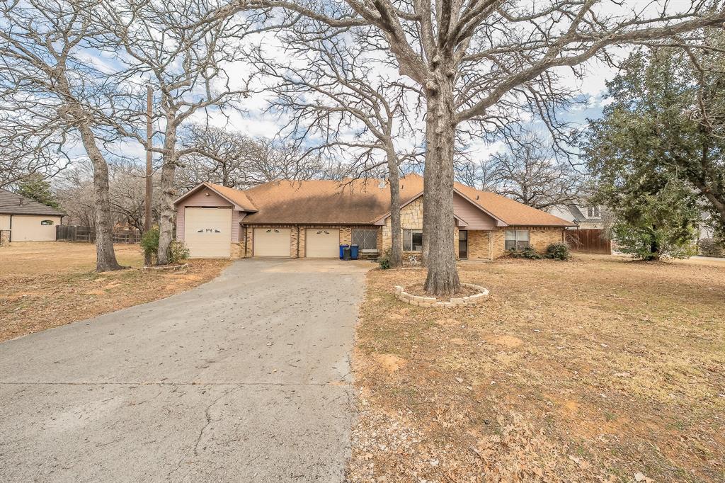 6313 Bettinger is 2 lots This listing is for the home and and one lot . The second lot is also for sale.  survey is attached . The home has had some  updates started. Bring your designer or builder and create your dream home with no HOA.The home features an attached three car garage one stall is for tall camper parking. There is an additional 2 car garage-shop in the back yard. Lot has beautiful trees and sandy soil. Bettinger Place is an area in North Colleyville with older homes that is quickly converting  to large new contraction estate homes. Please contact agent with any questions