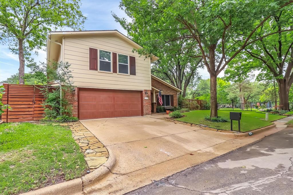 Charming 2-story traditional nestled on a quiet circle street in the heart of the highly sought-after Prestonwood neighborhood. Adjacent to a beautifully manicured private community park, this well-maintained 4-bedroom, 3-bath home offers a warm and inviting floor plan with generous living spaces, classic brick exterior, and mature trees that provide wonderful curb appeal and shade throughout the year.

The main level features 2 spacious living rooms with a wood-burning fireplace, formal dining room, and an eat-in kitchen with ample cabinet storage and natural light. All three full bathrooms — a rare find in this neighborhood — are thoughtfully placed for family and guest convenience. Upstairs, the private primary suite is a serene retreat with a recently remodeled full ensuite bath, heated towel bar and sizable closet space.

Enjoy the covered patio and private, fully fenced backyard — perfect for entertaining or relaxing Texas evenings. The 2-car garage provides additional storage space. Located minutes from Preston Road dining, LBJ Freeway, and the Shops of Prestonwood, with zoning to the acclaimed Richardson ISD including Bowie Elementary, Westwood Magnet, and Pearce High School.