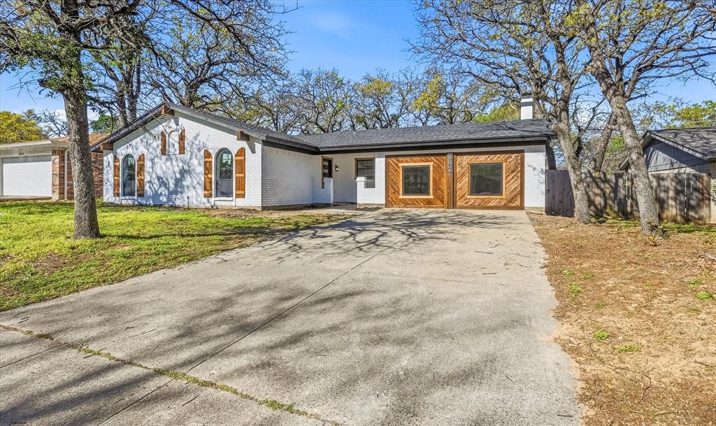 ***BACK ON MARKET FOR FAULTY LENDING**

Fully renovated home in highly sought-after SW Arlington featuring a brand-new roof and high-end updates throughout. This 3-bedroom, 2-bathroom home offers a spacious layout, including a versatile bonus room anchored by a stunning brick fireplace. Every detail has been thoughtfully updated, creating a move-in ready home that blends modern finishes with timeless character.