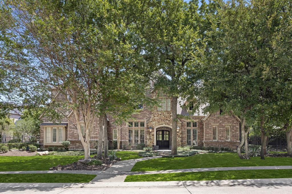 Welcome to your dream estate in the highly sought-after Kirkwood Hollow community! Situated on over half an acre in the award-winning Carroll ISD, this beautifully updated residence blends luxury, comfort, and thoughtful design with resort-style amenities. Every detail has been carefully curated, making this home as functional for everyday living as it is stunning for entertaining. From the moment you enter, the home makes an unforgettable impression with a dramatic sweeping staircase and soaring floor-to-ceiling windows that fill the entry with natural light. The chef’s kitchen is a true centerpiece, featuring a 6-burner gas range, oversized island with seating, built-in coffee maker, wine fridge, and abundant storage. Designed for both gourmet cooking and effortless entertaining, the kitchen flows seamlessly into the spacious living areas. Updates throughout the home include a remodeled kitchen and bathrooms, a refreshed game room, and upgraded lighting fixtures, giving the property a fresh, modern feel. The primary suite serves as a private retreat with a spa-like bath showcasing an elegant dual shower and refined finishes. A custom utility room with a second-floor laundry chute adds convenience, while the third-floor exercise room provides a flexible space for wellness or hobbies. The expansive game room comes equipped with a screen and projector, creating a true media experience for family nights or hosting friends. Step outside into your backyard paradise, designed for relaxation and recreation. A diving pool with attached spa and dramatic waterfall feature anchors the space, while the outdoor kitchen with built-in grill offers the perfect setting for gatherings year-round. With over half an acre, there is ample room for both play and privacy. As part of the prestigious Kirkwood Hollow community, residents enjoy exclusive access to a clubhouse, neighborhood swimming pool, tennis courts, greenbelt, jogging and biking trails, and a children’s playground.