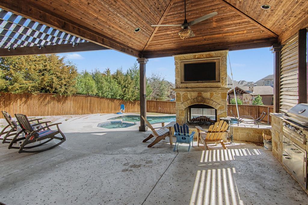 This beautiful, spacious, well-maintained 6 bedroom, 5 bath home is located in The Highlands at Trophy Club and is within top-rated Northwest ISD. This home is situated on an oversized lot & is within walking distance to the golf course. It has amazing curb appeal and a backyard perfect for entertaining including a pool & spa, covered patio, stone fireplace & outdoor dining space. Inside offers an open floor plan with so many upgrades! The primary suite is downstairs for privacy, along with a guest suite, private office and bonus room that can act as a 6th bedroom or 2nd office. Upstairs includes 3 bedrooms with Jack & Jill baths. A media room including projector and large screen,  a large 2nd living room or game room. There is also a built in desk! This home is a must see! Perfect for a large family & effortless entertaining. Only 20 minutes from DFW Airport & even closer to a plethora of dining and shopping. You are surrounded by all of the amenities of Trophy Club. This home really has it all & is move in Ready!  Schedule your showing today & Please look over the attached UPGRADE list, that incudes Tesla solar panels & Powerwall and so much more.
