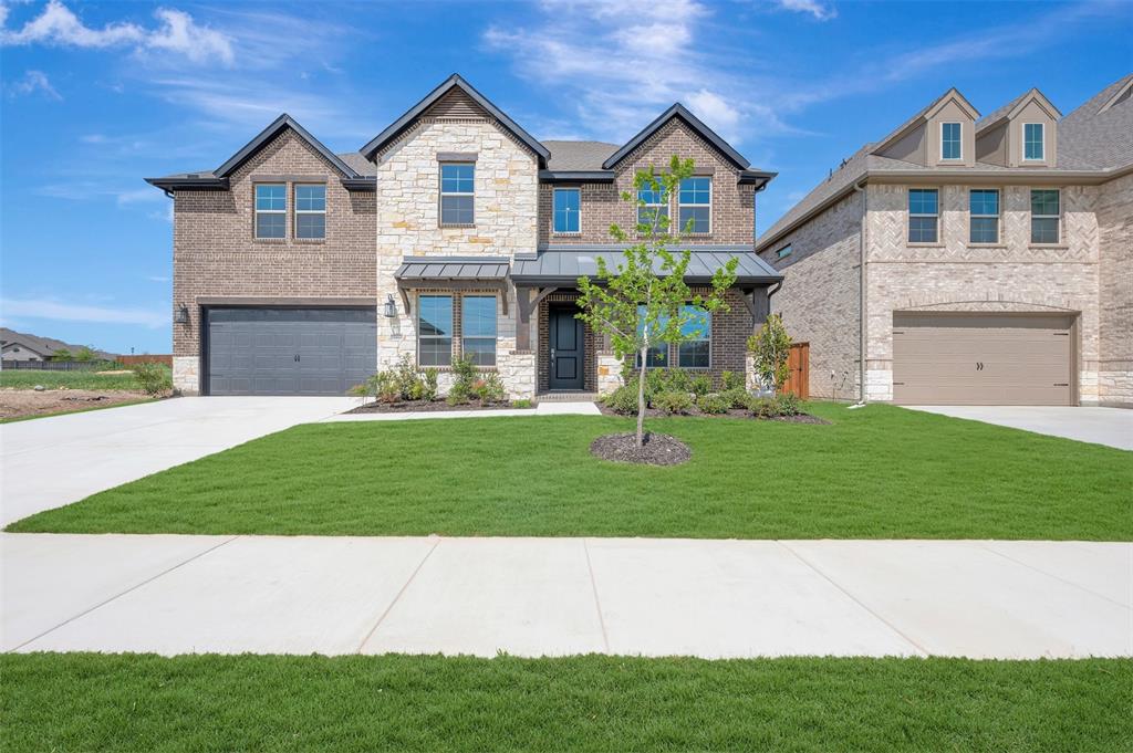 Located in Northwest ISD! This stunning 2-story home provides a comfortable open floorplan with an Extra Suite off the foyer with an ensuite bath, perfect for multigenerational living. A convenient home office off the foyer provides privacy with barn doors and ample storage space. The chef kitchen features a spacious island and overlooks the well-lit great room. A sunlit dining area allows access to an expansive covered patio for outdoor entertaining. In from the garage, a HovHall with valet and laundry room keep your home tidy. The primary suite includes a private bath with freestanding tub and split vanities. A versatile upstairs loft and 3 secondary bedrooms allow for comfort for all. Located in Wellington, the neighborhood offers a variety of amazing amenities including a resort-style pool, multi-use amenity center, playground, and walking trails.