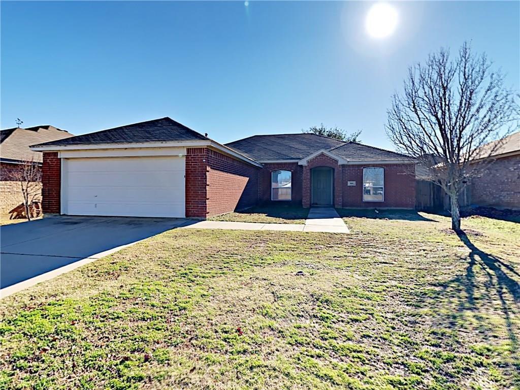 This gorgeous three-bedroom, two-bathroom home features a functional two-car garage and an inviting, open-concept layout. At the heart of the residence is a large living area centered around a cozy corner wood-burning fireplace, which flows seamlessly into a gourmet kitchen designed for both style and utility. The kitchen itself is a chef’s dream, boasting a central island, a charming breakfast nook, and an abundance of cabinet and counter space for all your culinary needs. Thoughtfully designed with a split-bedroom floor plan for enhanced privacy, the home offers a serene master suite complete with a garden tub, dual sinks, a separate shower, and a spacious walk-in closet. Throughout the interior, you will find tasteful neutral tones complemented by 2-inch blinds and ceiling fans for year-round comfort. The exterior is equally impressive, featuring a covered front porch, a sprinkler system for easy lawn maintenance, and a private open patio perfect for outdoor relaxation.