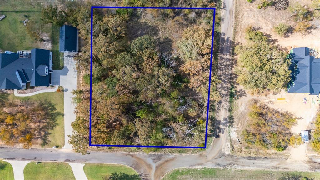 Surrounded by beautiful newer homes, build your dream place and create a backyard oasis under a wooded canopy. In the community of Country Club Estates, this wonderfully wooded 1.09-acre corner lot sits within walking distance to the golf course! Enjoy resort-like living in this quiet neighborhood while being a golf cart away to Country Club amenities that includes a swimming pool, restaurant, fitness center, fishing, and an 18-hole golf course. Drive within minutes to the vibrant and beautiful downtown plaza with shopping, boutiques, dining, and popular annual events on the square. For more recreational fun, take advantage of nearby lakes such as boating on Lake Cypress Springs, fishing on Lake Bob Sandlin, Lake Fork, and camping at Cooper Lake State Park or Bob Sandlin State Park. All this conveniently located near Interstate 30, only 1.5 hours from Dallas!  Buyer is required to maintain a membership to the SSCC as soon as their home has been completed.  Currently $350 initial fee and $110 per month for social membership.  Memberships vary.  CC Estates currently has no HOA established, or fee.  See docs.  Brinker Water Supply current meter cost $2,900 Buyer and Buyer's agent to verify all information.