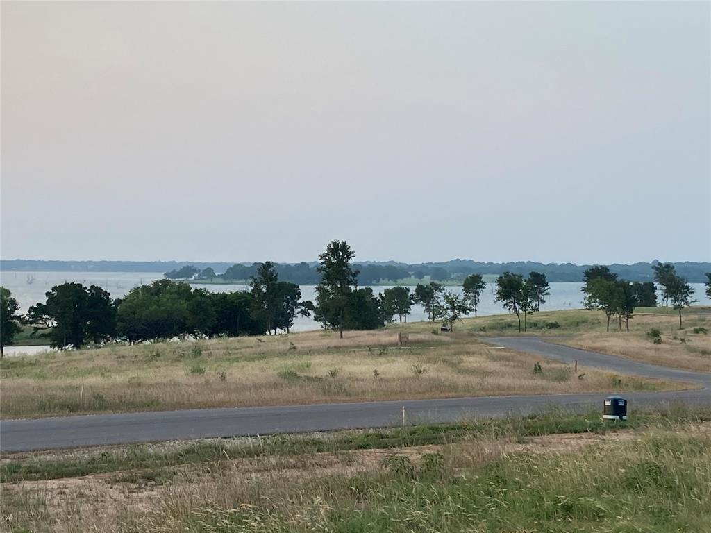 Just over an acre that sits high enough to offer unobstructed views of Richland Chambers Lake and the surrounding landscape. BOAT SLIP 5 IS PRIVATELY OWNED AND CONVEYS WITH THIS LOT ($45,000 value). This is the perfect opportunity to build your dream home while enjoying lake life.  Richland Park is a gated community offering outdoor amenities including boat ramps, an outdoor entertainment pavilion with a fire-pit as well as a community park area with a playground, fishing pond and pier. Minimum building square footage is 1600 square feet with no time frame to begin construction.