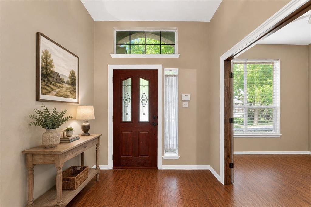 WAIT…DON’T SCROLL BY THIS ONE! If you’ve been searching for a home that offers extra space, modern updates, and a fantastic location, this one deserves a spot at the top of your list.  This beautifully maintained 4-bedroom, 2-bath home combines comfort, flexibility, and style with fresh interior paint, gorgeous flooring, granite countertops, and an abundance of natural light throughout. The open-concept layout creates an inviting atmosphere that’s perfect for everyday living, family gatherings, and entertaining friends.  The kitchen offers plenty of space to cook, connect, and create lasting memories. One of the home’s standout features is the spacious upstairs 4th bedroom. Complete with a closet, this versatile space can easily serve as a private guest suite, game room, media room, home office, workout space, or flex room, giving you the freedom to make it fit your lifestyle. The primary suite provides a peaceful retreat, while the additional bedrooms offer plenty of room for family, guests, or hobbies.  You’ll also enjoy peace of mind with major updates already completed, including newer windows, a roof approximately five years old and fresh paint. Located in highly sought-after McKinney ISD and just minutes from shopping, tons of dining options, entertainment, and US 75 - Central Expressway and walking distance to the beautiful Bonnie Wink Park with playgrounds and a dog park.