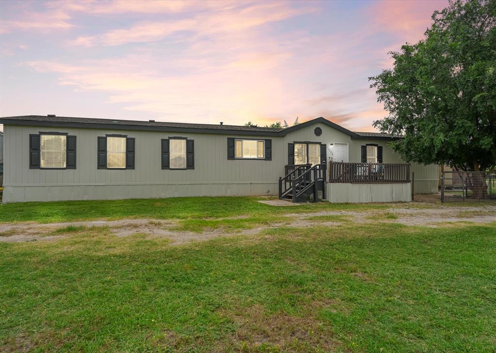 Welcome home to 10000 Chance Lane in Kaufman, TX! A beautifully updated 4-bedroom, 3-bath mobile home offering 2,128 square feet of thoughtfully designed living space. This home is move-in ready with a Freshly Painted Interior and Complete Exterior that radiates charm.

The generous 1-acre CORNER lot is a true standout, featuring gated driveway, full fencing and cross fencing with dedicated horse pens and a secure dog yard perfect for equestrian enthusiasts and pet owners alike. An RV hookup with 30-50 amp service with 4 x 120 amp plugs and an in-ground propane line adds incredible versatility for those who love adventure on the road.

Inside, low-maintenance luxury vinyl plank flooring flows throughout the home, while the primary closet features custom wood shelving. The guest bath features a convenient double sink addition. New trunk and crossover ducting complement an HVAC system just three years old with a 10-year transferable warranty for continued peace of mind.

Outside, you'll find a practical storage shed and updated skirting with a cement base for superior moisture protection. Nearby, Kaufman County Veterans Memorial Park offers scenic outdoor recreation just minutes away.

Schedule your showing today!