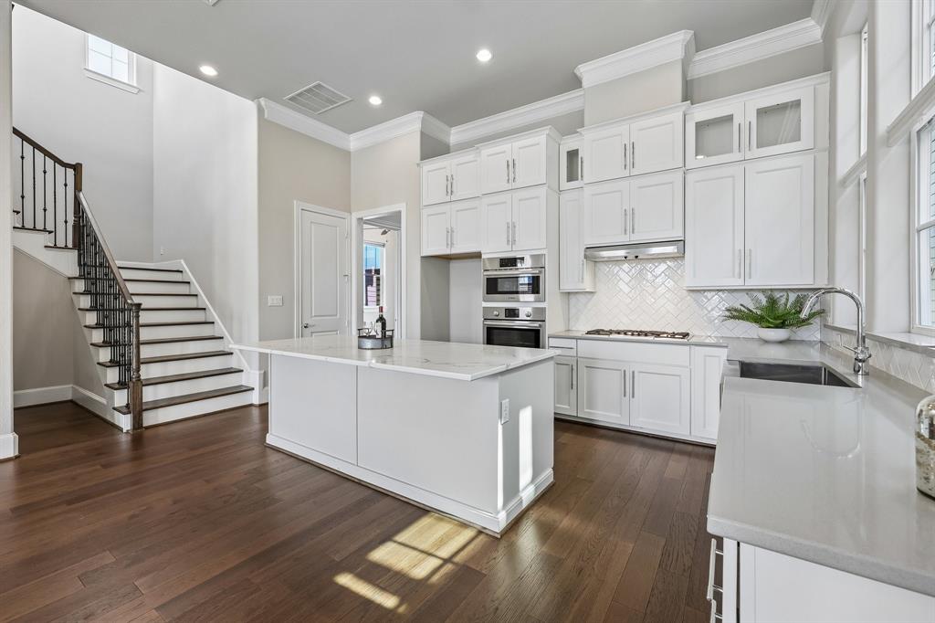 Flexible spaces, designer finishes, and a location you'll love! This beautifully appointed 4-bedroom, 3-bath home features an open-concept layout, stunning kitchen, and abundant natural light throughout. Rarely does a floor plan offer this much flexibility. Whether you need four or five bedrooms, two home offices, a nursery, a media room, or a private guest suite, this thoughtfully designed home adapts to your changing needs. The study can serve as a fourth bedroom, while the bonus room attached to the primary suite creates the perfect nursery, office, sitting room, or fitness space. Be sure to look at the floor plan in the photos. Combined with designer finishes, soaring ceilings, an incredible kitchen, and a prime Plano location, this is a home designed to grow with you.