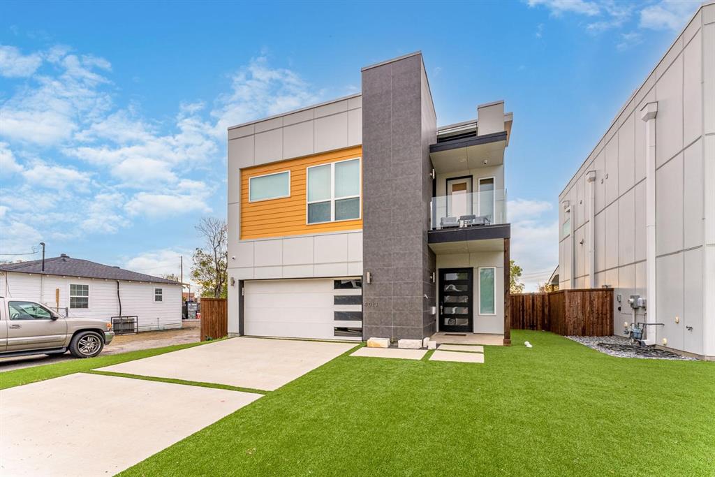 Contemporary-Modern, 2018 build outfitted with solar panels, a water purification system, and a rooftop balcony that has Downtown Dallas views. Fully turfed yards, including the rooftop balcony! Rooftop balcony also has water and gas connections. This home includes 3 bedrooms, 2.5 baths and an open-layout on the first floor. School systems in the area include Dallas Independent School District, the West Dallas Community School, and Uplift Education.