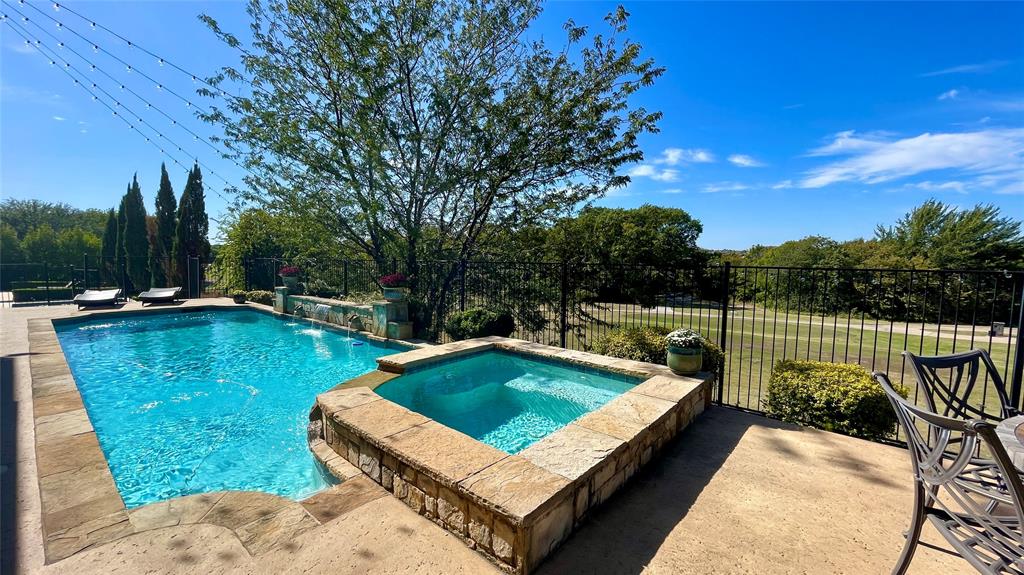 Back on market, buyer fell through! Incredible custom-built, single-owner home.This entertainer's dream has spectacular views of Twin Creeks golf course, a heated pool, and over 5300 sq ft of space. Welcome guests with iron double doors, soaring foyer, curved staircase, and impressive dining area. An open floorplan provides flow, while entertaining is easier with two dishwashers, a trash compactor, gas range and griddle, an island and full-size bar. Spacious living room has vaulted ceilings, a fireplace, and stacked windows overlooking the pool and extended outdoor patio with wetbar. Relaxing owner's suite with sitting area, custom closet, jetted tub, walk-in shower, plus private door to the pool. Laundry equipped for two sets of washers and dryers. Escape to your private study, media room with projector, or game room with 24x10 balcony! Upstairs has a suite with private bath. Bedrooms oversized with walk-in closets and ensuite bath. Amazing HOA amenities. Your resort lifestyle awaits!