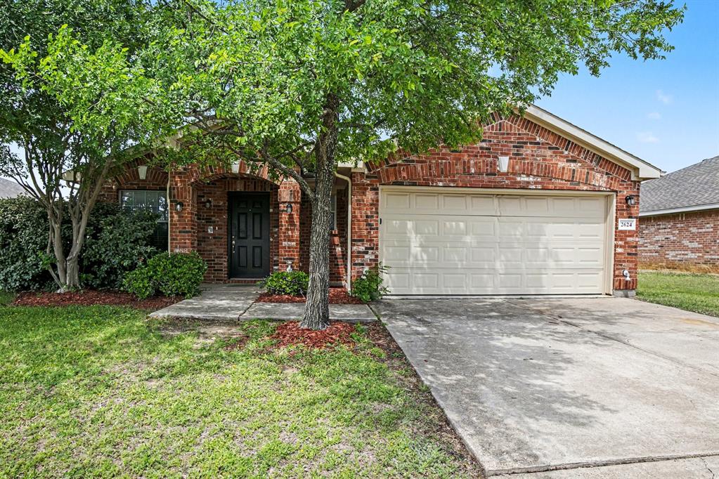 One or more photo(s) was virtually staged. Embrace wonderful neighborhood living in the highly desirable Valley Heights community! This charming brick residence offers a fantastic open floor plan with high ceilings and a warm, inviting space highlighted by a detailed fireplace mantle. The kitchen comes equipped with sleek stainless steel appliances, creating a polished space for meal preparation. Step outside to your backyard, perfect for outdoor relaxation or entertaining. Conveniently located just minutes from local parks, daily shopping centers, and excellent neighborhood amenities, this home provides effortless access to everything you need. Schedule your tour today!