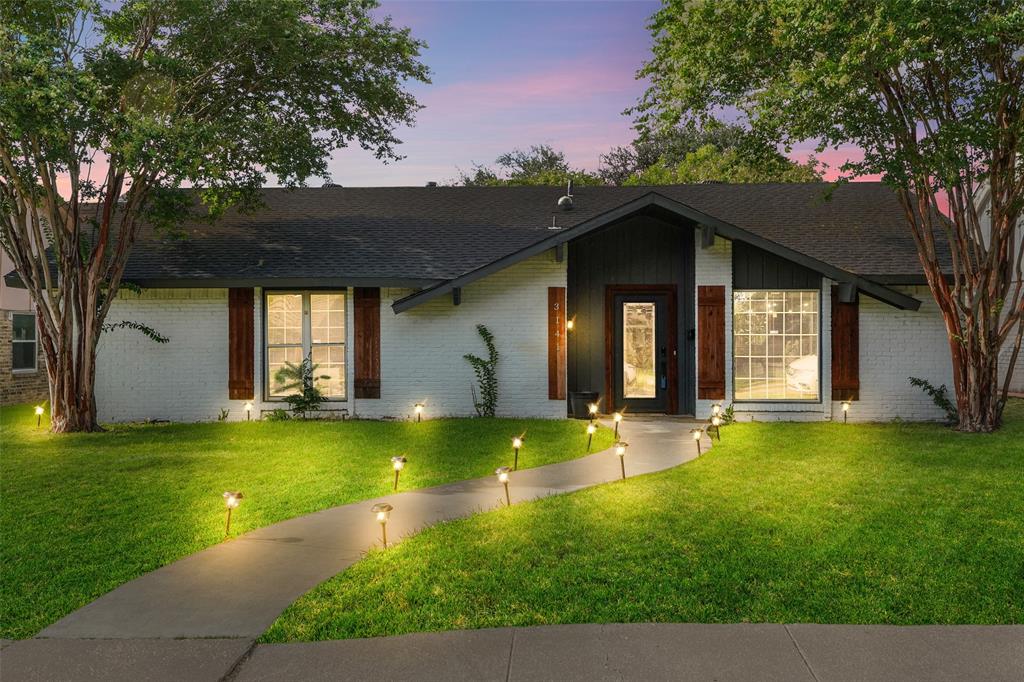 Welcome to this stunningly remodeled Dallas home, where modern elegance meets comfort and functionality. Thoughtfully designed with a beautifully distributed layout, this home offers an exceptional flow from the moment you enter.

The inviting dining area and hallway create the perfect opportunity for a coffee bar, wine bar, or stylish entertaining space. The show-stopping open-concept kitchen seamlessly connects to the spacious living room, featuring elegant finishes, a brand-new gas range and dishwasher, a large counter for casual dining, soaring ceilings, a cozy fireplace, and abundant natural light throughout.

The oversized primary suite is a true private retreat, offering incredible space for a sitting area or coffee nook, along with a beautifully updated ensuite bathroom featuring double sinks and a walk-in closet. Two additional bedrooms, a full bathroom, and a bright flex space with backyard access provide the perfect setup for a home office, creative space, or additional living area.

Step outside to your private backyard oasis surrounded by mature trees providing shade and tranquility—perfect for entertaining guests, relaxing, or creating unforgettable family memories.

Additional upgrades include new laminate flooring throughout, updated sewer line, modern fixtures, and thoughtful improvements completed with quality and style in mind.

A beautifully remodeled home with an ideal layout, modern finishes, and spaces designed for the way you live today. This incredible opportunity will not last long!