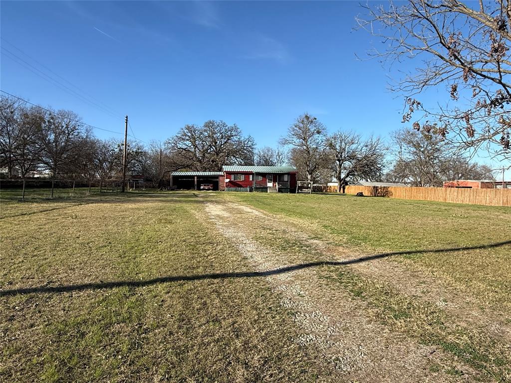 Charming Opportunity on Over an Acre in Town!
Perfect for first-time homebuyers or investors, this property offers incredible potential with just a little TLC. Situated on over 1 acre within city limits, the home features a spacious side lot ideal for animals, gardening, or future expansion—a rare find in town. Enjoy the convenience of being just minutes from the growing west side of town and nearby new development, offering shopping, dining, and amenities close by. Whether you’re looking to build equity or add to your investment portfolio, this property provides space, location, and opportunity. Sold as-is for cash or conventional financing.
Washer, dryer and refrigerator stay with the property.