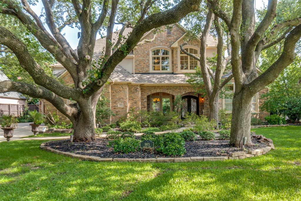 This one-of-a-kind, custom-built 5-bedroom home offers an ideal layout for luxury living and entertaining, yet maintains a warm and welcoming environment for families. Sited on .4-acres in the highly desirable private school corridor of Preston Hollow, and moments from Preston Royal, the property is framed by majestic, mature trees. A grand entryway welcomes you with curved staircase beneath a stunning domed ceiling. Floor-to-ceiling windows bathe the interiors in natural light, highlighting the rich hardwood flooring extending throughout the first-floor living spaces. The home features 5 living areas—two of which are ideal for working from home: a stately library and adjoining private office. The 1st floor guest suite with en-suite bath offers privacy for visitors. The spacious primary suite features new carpet, a corner fireplace, and 2 separate bathrooms connected by an oversized walk-in closet for optimal privacy. The gourmet kitchen is equipped with premium appliances, including granite countertops, a Sub-Zero double refrigerator, Wolf 6-burner gas cooktop with pot filler, Thermador double ovens, two dishwashers, and prep sink. A large island anchors the space, perfect for entertaining, and opens to the dramatic 2-story family room with wet bar and icemaker. Enjoy time outdoors with a beautifully landscaped backyard featuring a spacious patio, built-in grill and fireplace, a sparkling pool, and a separate spa. A well-appointed laundry room with sink and generous cabinetry.  Amenities include a 3-car split garage with EV charger, Rachio smart sprinkler system,  Takagi tankless water heater, 1st floor generator,  Nest security cameras, and impeccably maintained mechanical systems.  Abundant storage throughout.  Located minutes from premier shopping and dining, quick access to DNT, LBJ Freeway, and downtown, this exceptional property combines elegance, comfort, and convenience in one of Dallas’s most sought-after neighborhoods.