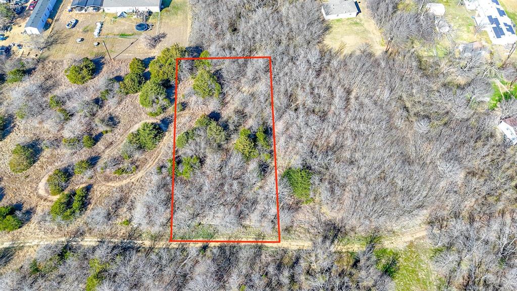 Build your next home in Mildred ISD on this spacious lot located just minutes from Richland Chambers Lake. The property offers plenty of mature trees, providing natural shade and privacy, making it a great canvas for a custom build. Situated in a quiet subdivision, this lot is ideal for those looking for a peaceful setting while still being close to the water and nearby amenities. If you’re searching for a wooded lot with potential in a desirable school district, this one is worth a look.