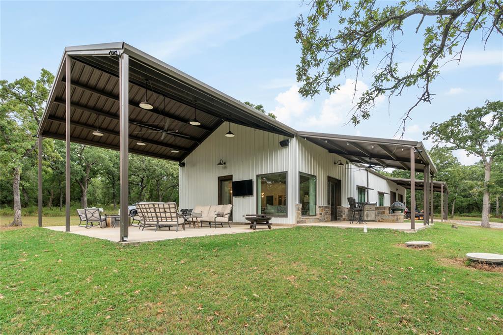 Welcome to the Southard Family Ranch, a rare 271 acre jewel tucked away in the rolling hills of North Texas. Perfectly positioned in the far northeastern corner of Jack County, this exceptional ranch sits almost midway between Jacksboro and Bowie, offering the ideal blend of seclusion and convenience. With excellent frontage along FM 1125, you’ll enjoy easy access to Bowie, Jacksboro, Decatur, and the greater DFW metroplex—while still savoring the peace and privacy of ranch life. This versatile property is well-suited for both recreation and ranching. Fertile pastures provide excellent grazing for cattle, while rugged, timbered terrain creates a thriving wildlife habitat for hunting and exploring. A beautifully appointed 3,000 square foot barndomenium overlooks a new 4 acre lake, stocked with fish and teaming with wildlife. Engineered slab with spray foam insulation and modern efficiency throughout. Spacious 30x60 living area with propane fireplace, 3 bedrooms and 2 baths, and separate 30x40 insulated garage or shop featuring 4 overhead doors and dedicated HVAC. Outdoors, enjoy a scenic 4-acre stocked lake, 3 additional ponds, a historic rock fence and hand-dug well. Private water well with 2000-gallon storage tank. Located in Bowie ISD, with rolling elevations from 1200’ to 1110’.  Excellent wildlife habitat as well as native grass for grazing. 70% grass and 30% wooded with beautiful rock outcropping on the hill top.  A brand new set of cattle pens makes it easy to work cattle.  A rare blend of comfort, recreation, and history. Located in the far North East corner of Jack County, a g=half mile west of Montague County line and south of the Clay County line. It is a short 14 miles to the historic town of Bowie for groceries, gear, and gas. A one and a half hour drive will put you at the gates of DFW Airport, and only 6 miles from Lake Amon G. Carter and 15 miles to Lake Bridgeport.