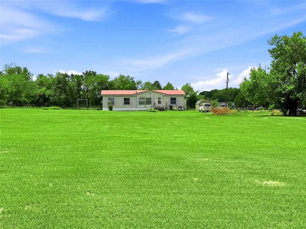 ENJOY THE PEACE AND PRIVACY of country living with this 1,456 square foot manufactured home situated on two acres. This property offers plenty of space to spread out while being just a few miles outside of town.