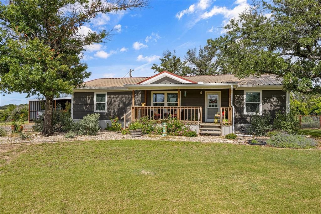 This beautifully updated home on 1.4+,- Acres, thanks to a thoughtful remodel. Located out of the city limits of Stephenville Texas, surrounded by large parcels of land with amazing views, whether from inside the home, the porches, or the yard.  Step inside to find fresh interior finishes, updated flooring, and a bright, open layout that feels both inviting and functional. The kitchen has been transformed with contemporary custom cabinetry, sleek countertops, and newer appliances, creating a space that’s perfect for everyday living and entertaining. Home offers and oversized walk-through pantry to the laundry-utility room. The bathrooms have been refreshed with updated fixtures, and lighting, giving them a clean, modern feel. Throughout the home, improvements such as updated paint and trim add a cohesive, polished look.  Outside; new automatic gated entrance, the property has updated landscaping, hardie board siding, newer windows, enhanced custom pipe fence for the backyard, an oversized two space carport, and porches that extends the home’s usable space. Altogether this is a clean and efficient home, schedule your private showing today.