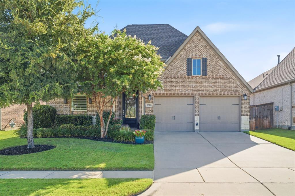 Welcome to this beautifully appointed single-story home in the highly sought-after Trinity Falls community! Ideally located across from a park, pickleball & basketball courts, and just around the corner from the community’s 2nd resort-style pool & fitness center, this home offers one of the best locations in the neighborhood. 
Inside, you’ll find wood-look tile flooring throughout the main living areas, soaring 10-ft ceilings, tray ceilings in entry, arched doorways, plantation shutters throughout, custom lighting, spacious rooms, & abundance of natural light throughout the home. Private office features double glass doors & custom built-in cabinetry for printers and office supplies. 
Split-bedroom floor plan includes a private guest suite at the front of the home with its own ensuite bath featuring a walk-in shower and walk-in closet. 2 additional secondary bedrooms share a nearby hall bath.
The chef’s kitchen is the heart of the home w ss appliances, a gas cooktop, pantry, oversized island w breakfast bar seating, and abundant cabinetry. The kitchen opens seamlessly to the dining area & family room with a cozy gas fireplace overlooking the backyard. Entertain with ease thanks to the custom built-in entertaining bar featuring glass-front cabinetry, a beverage frig, & additional serving buffet with extensive drawers and storage.
The spacious primary suite offers a luxurious bath with dual vanities, garden tub, separate shower, linen closet, and separate his-and-her walk-in closets.
Additional features include a mudroom w bench, hooks, and extra storage off the garage.  Utility has room for a second refrigerator.
Relax out back extended covered patio with a mature shade tree and grassy play area.
HOA incl multiple pools, fitness center, fishing ponds, wooded hiking and walking trails, dog park, playgrounds, parks, and year-round resident events. Experience the exceptional lifestyle that makes Trinity Falls one of McKinney’s premier master-planned communities.