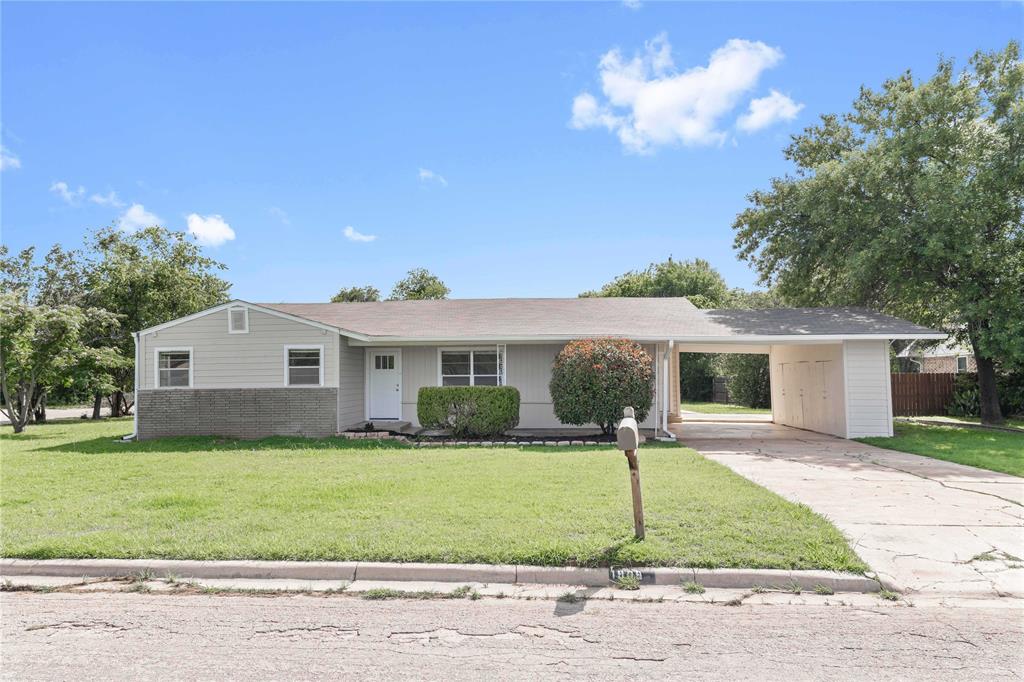 Charming and beautifully refreshed 2-bedroom, 2-bath cottage situated on a spacious corner lot in the heart of Brownwood, Texas. Offering approximately 1,577 square feet of living space, this move-in-ready home combines timeless character with numerous recent updates.

Recent improvements include fresh interior and exterior paint, a new front door, updated kitchen cabinet paint inside and out, additional LED lighting in the kitchen and living areas, a newer electric water heater, foundation work, professionally cleaned windows, carport ceiling repairs, front porch enhancements, a new bathroom vanity light, and many additional make-ready improvements. The electric central heat and air system, breaker box, and meter mast have also been updated in recent years.

The home's original hardwood floors add warmth and character throughout much of the living space, while ceramic tile flooring provides durability and easy maintenance in the kitchen. With two bedrooms, two full bathrooms, and generous living areas, this home offers a rare combination of space, comfort, and value.

Outside, a large concrete patio just beyond the carport creates the perfect setting for outdoor entertaining, grilling, relaxing around a fire pit, or simply enjoying additional outdoor living space. If you're looking for a well-maintained home with classic cottage charm and modern updates, this property deserves a place at the top of your list. Homes offering this much space, character, and recent improvements at this price point are becoming increasingly difficult to find. Whether downsizing or shopping for your first home, this one will fit your needs.
