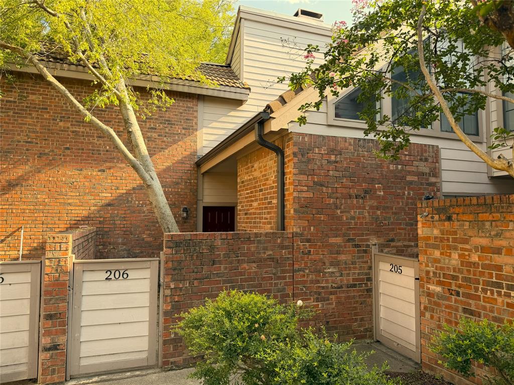 New paint and Vinyl wood like floor of room in 3 bedroom, 3 full bath corner lot townhouse ! Private courtyard to condo. Mirrored entry to family room and fireplace. Breakfast bar open to kitchen. 1 bedroom & 1 bath downstairs, back entrance to 2 assigned covered parking. Vaulted ceiling in den and lots of windows on secluded backyard & large patio. Master bedroom, master bath, 3rd bedroom with bath upstairs while balcony separates rooms for complete privacy.