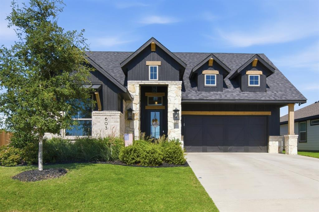 Better than new and built in 2024, this stunning 3-bedroom, 2-bath home offers 1,737 square feet of thoughtfully designed living space in the highly sought-after Burleson ISD. Soaring 11-foot ceilings and a vaulted living room accented with a beautiful wood beam create an open, inviting atmosphere. The spacious living area features an elegant electric fireplace with mantel, while the chef's kitchen is equipped with granite countertops, GE Profile stainless steel appliances, and a convenient mudroom just off the garage.

The private primary suite is designed for relaxation with a luxurious spa-inspired bath featuring a freestanding soaking tub, separate glass shower, dual vanities, and granite countertops. Ceiling fans are installed throughout the home for year-round comfort.

Step outside to a covered patio overlooking peaceful greenspace with no rear neighbors. The oversized backyard offers endless possibilities with plenty of room for a pool, workshop, garden, or outdoor entertaining. A combination of 6-foot wood privacy fencing and wrought iron fencing provides both privacy and scenic views.

Conveniently located just minutes from shopping, dining, and entertainment, this exceptional home combines modern style, quality finishes, and a premium homesite in one outstanding package.
